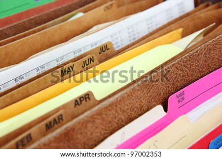 Files. Closeup of folders in expending file pockets