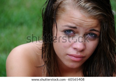 stock photo This is a very unhappy tearful teen
