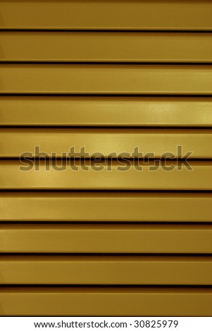 Yellow stripes texture of metal window shield.