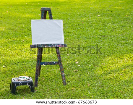 The painting board on fresh green grass