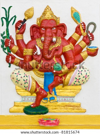 Indian God Ganesha or Hindu God Name Taruna  Ganapati avatar image in stucco low relief technique with vivid color,Wat Samarn temple,Thailand.