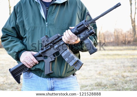 Man holding M4 Rifle