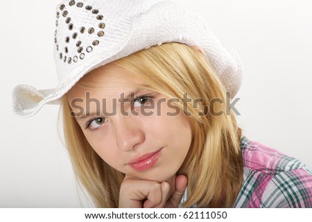 stock photo Young preteen girl with cowboy hat in studio pre teen