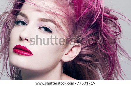 Beautiful young woman with dyed purple hair