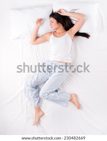 Sleeping woman in free fall position