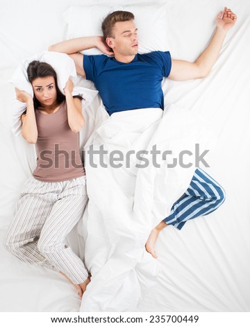 Top view photo of couple in bed