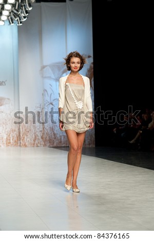 KIEV, UKRAINE - OCTOBER 17: Fashion model wears clothes created by \