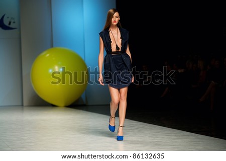KIEV, UKRAINE - OCTOBER 16: Fashion model wears clothes created by \