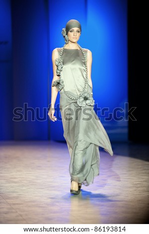 KIEV, UKRAINE - OCTOBER 19: Fashion model wears clothes created by \