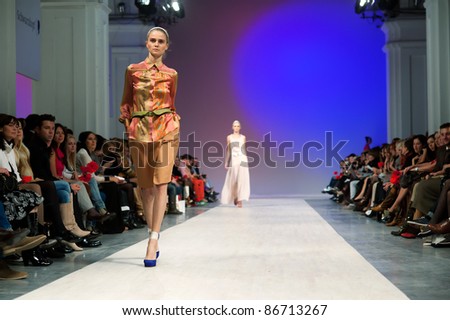 KIEV, UKRAINE - OCTOBER 14: Fashion models wear clothes created by \