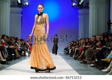 KIEV, UKRAINE - OCTOBER 14: Fashion model wears clothes created by \