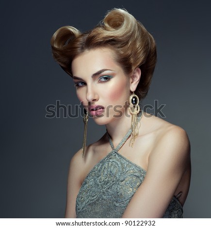 Beautiful fashion girl with retro hairstyle