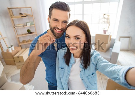 Young couple moving to a new apartment together relocation