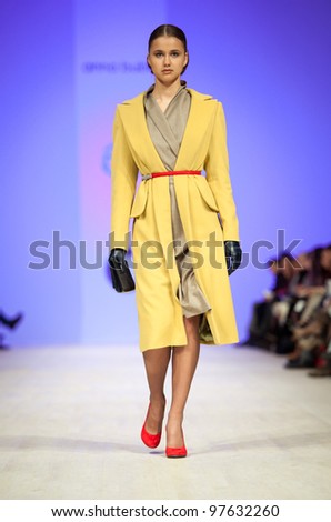 KIEV, UKRAINE - MARCH 14: Fashion model wears clothes created by 