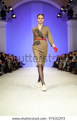 KIEV, UKRAINE - MARCH 14: Fashion model wears clothes created by \