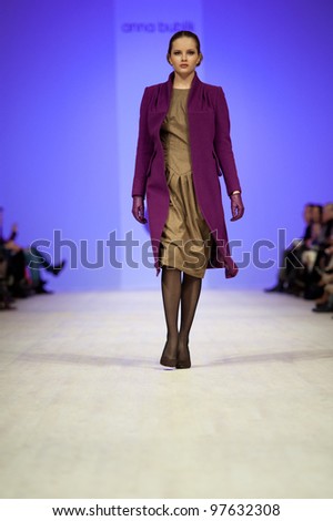 KIEV, UKRAINE - MARCH 14: Fashion model wears clothes created by \