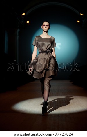 KIEV, UKRAINE - MARCH 15: Fashion model wears clothes created by \