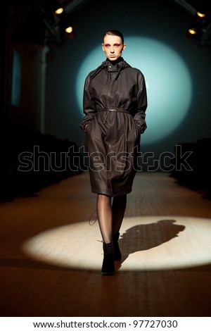 KIEV, UKRAINE - MARCH 15: Fashion model wears clothes created by 