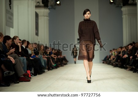 KIEV, UKRAINE - MARCH 14: Fashion model wears clothes created by 