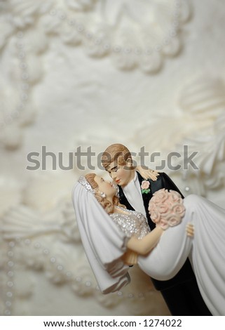 stock photo Bride and Groom Wedding Cake Figurines room for text 