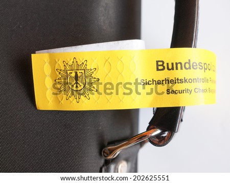 BERLIN, GERMANY - MAY 27, 2014: Police baggage security check at German airport check in