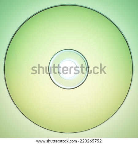 Vintage looking Yellow CD or DVD for music data video recording isolated over white background