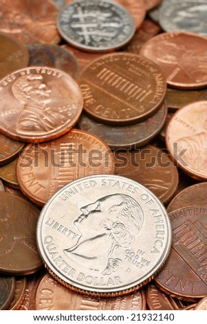 Quarter dollar macro closeup over coins