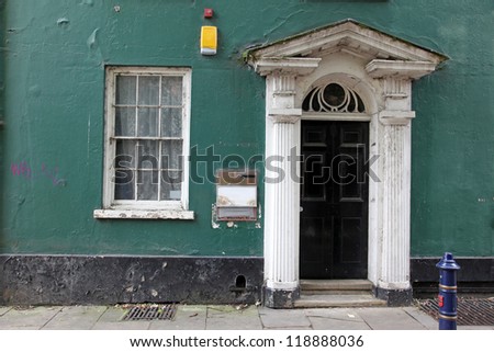 Old classic victorian door and window in England, UK