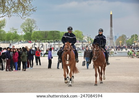 PARIS - APRIL 27: French police control the street, Paris the 27 april 2013, France. Paris is one of the most populated metropolitanareas in Europe