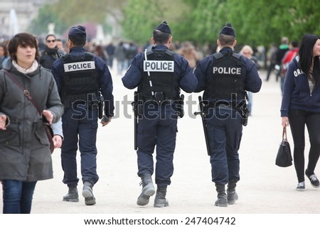 PARIS - APRIL 27: French police control the street, Paris the 27 april 2013, France. Paris is one of the most populated metropolitanareas in Europe
