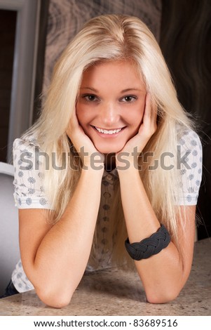 Young joyful lady with pretty blond hair