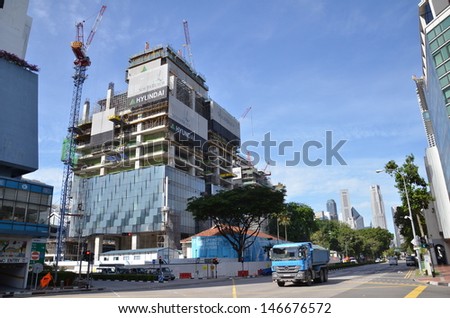 SINGAPORE-JULY 06:  Construction of new office building on July 06, 2013 in Singapore. Singapore\'s office property market is on track to recover from a weak closing in 2012.