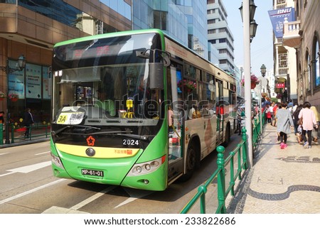 MACAU, CHINA - NOV 19:  Passengers travel on the bus  in Macau on November 19, 2014. TRANSMAC and TCM are the two bus companies operating all public and mini buses in Macau.