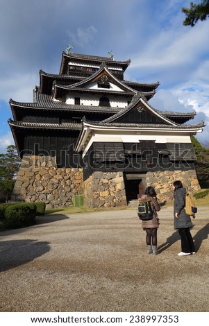 SHIMANE, JAPAN - DECEMBER 06: Tourists visit Matsue samurai feudal castle in Shimane prefecture on December 06, 2014., This castle also known as Black castle in Shimane prefecture.