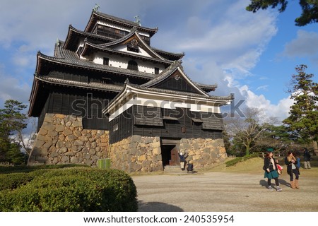 SHIMANE, JAPAN - DECEMBER 06: Tourists visit Matsue samurai feudal castle in Shimane prefecture on December 06, 2014., This castle also known as Black castle in Shimane prefecture.