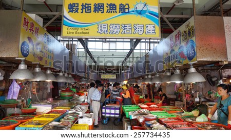 DONGGANG, TAIWAN - NOV 20: Shoppers visit the famous seafood market in Donggang, Taiwan on November 25, 2015. Dong Gang Seafood Market is near Kaohsiung City and offers the freshest seafood in Taiwan