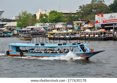 BANGKOK THAILAND - MAR 25: The tourists get on boat for sightseeing along Chao Phraya River in Bangkok on March 25 2015.