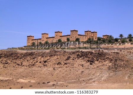 Morocco Atlas Mountains - Kasbah built in adobe overlooking a fertile valley between Marrakesh and Ourika