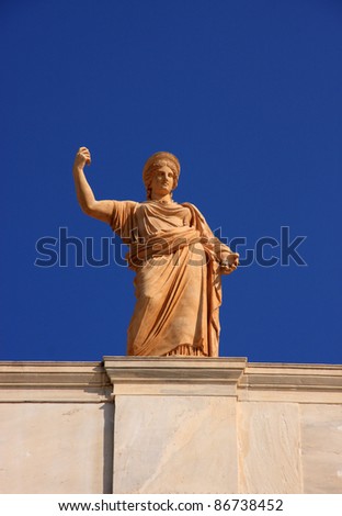 Greece Athens Archaeological Museum - Statue of a goddess on the building facade