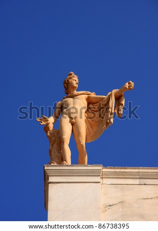 Greece Athens Archaeological Museum - statue of a male figure on the roof-top