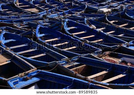 Morocco Essaouira fishing fleet of typical blue wooden boats berthed in the ancient port
