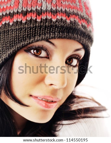 Beautiful young woman\'s fresh face wearing hat.