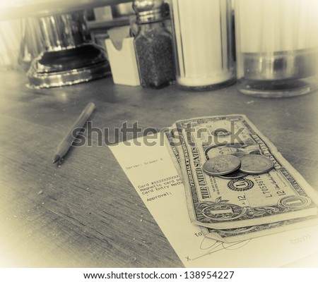 Don\'t forget to tip!  Art photo - intentional grain and noise with yellow tonality and vignette.