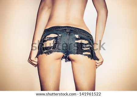 Sexy Woman Wearing Denim Shorts With Holes