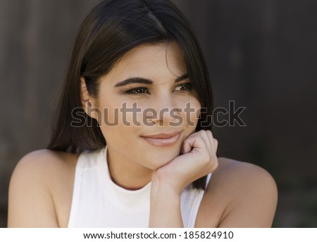 Happy relaxed woman looking to the side