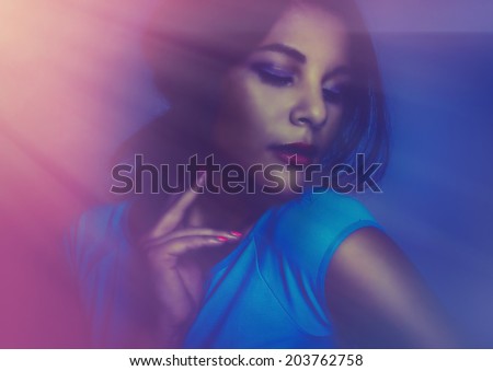 Beautiful young woman eyes closed head turned to side