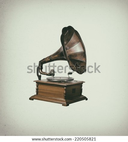 Photo of retro gramophone isolated over vintage stain background