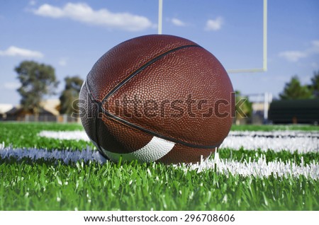 American football on find with goal posts