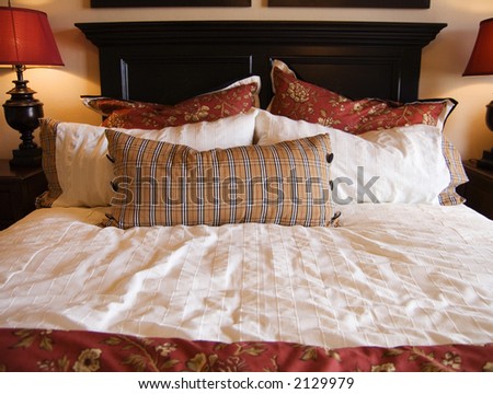 Luxury Bedroom Furnishings with rich dark wood