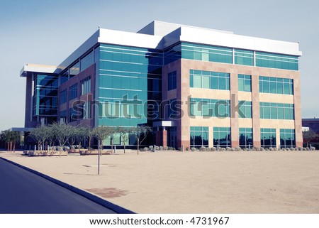 Modern Commercial Building: instant photo style, Shadows are blue, High Contrast.